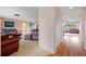 Spacious living room showcasing neutral colors and a smooth flow to the dining area at 916 S Gondola Dr, Venice, FL 34293