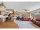 Open floor plan featuring a bright living room, an adjacent office space and eat-in kitchen at 916 S Gondola Dr, Venice, FL 34293
