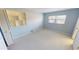 Bedroom with built-in shelving, and a window bringing in natural light at 931 Bal Harbor Blvd, Punta Gorda, FL 33950