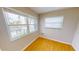 Corner bedroom with hardwood floors offering waterfront views at 931 Bal Harbor Blvd, Punta Gorda, FL 33950