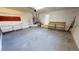 Spacious two-car garage with white walls, an automatic door, and storage shelves at 931 Bal Harbor Blvd, Punta Gorda, FL 33950
