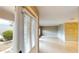 Bright living space with neutral walls, tiled flooring, and a view through the open front door at 931 Bal Harbor Blvd, Punta Gorda, FL 33950
