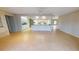 Open floor plan featuring tile floors and a bar area connecting to the kitchen, ideal for entertaining at 931 Bal Harbor Blvd, Punta Gorda, FL 33950