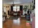 Inviting living room with hardwood floors, ceiling fan, and comfortable seating at 22480 Oceanside Ave, Port Charlotte, FL 33952