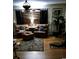 Inviting living room with comfortable seating, zebra rug, and decorative plant at 22480 Oceanside Ave, Port Charlotte, FL 33952