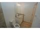 Cozy bathroom featuring a granite vanity top and a toilet with a matching tiled floor at 14081 Heritage Landing Blvd # 232, Punta Gorda, FL 33955
