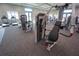 Modern gym equipped with weight machines and treadmills for a comprehensive workout experience at 14081 Heritage Landing Blvd # 232, Punta Gorda, FL 33955