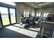 Well-lit gym featuring state-of-the-art cardio machines and ample natural light, providing a healthy and active lifestyle at 14081 Heritage Landing Blvd # 232, Punta Gorda, FL 33955