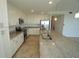 Spacious kitchen featuring stainless steel appliances, granite countertops, and a large center island at 14081 Heritage Landing Blvd # 232, Punta Gorda, FL 33955
