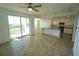 Open concept layout featuring kitchen with stainless appliances and covered balcony at 14081 Heritage Landing Blvd # 232, Punta Gorda, FL 33955
