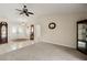 Inviting living room with high ceilings, neutral tones, and tiled flooring creating a welcoming atmosphere at 1452 Wassail Ln, Punta Gorda, FL 33983