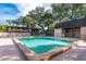Inviting community pool with lounge chairs and lush landscaping offering a relaxing outdoor space at 1515 Forrest Nelson Blvd # R201, Port Charlotte, FL 33952