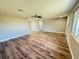Spacious living room with new floors, neutral walls and an open layout with ample natural light at 1625 Meadow Lark Ln, Englewood, FL 34224