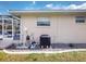 Exterior view of a home's screened patio, complete with outdoor equipment at 18226 Brazil Ave, Port Charlotte, FL 33948