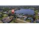 An aerial view shows waterfront access and nearby neighborhoods of this coastal community at 18419 Meyer Ave, Port Charlotte, FL 33948