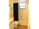Bathroom featuring tiled bathtub and shower combo with shelving for storage at 19505 Quesada Ave # Mm202, Port Charlotte, FL 33948