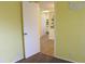 Bedroom showing entrance and view into kitchen at 19505 Quesada Ave # Mm202, Port Charlotte, FL 33948