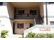 Condo building entrance with stairs leading to the upper units at 19505 Quesada Ave # Mm202, Port Charlotte, FL 33948