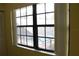 View from window overlooking screened-in community pool with lounge chairs at 19505 Quesada Ave # Mm202, Port Charlotte, FL 33948
