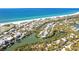 Scenic aerial view of a waterfront home boasting lush trees and picturesque water access and views at 20 Palm Dr, Placida, FL 33946