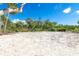 Expansive backyard offering endless possibilities for outdoor activities and enjoying the natural surroundings at 20 Palm Dr, Placida, FL 33946