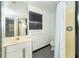 Full bathroom featuring a shower with curtain, vanity with sink, toilet, and neutral wall color at 20 Palm Dr, Placida, FL 33946