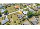 Aerial view of a single-Gathering home showcasing the backyard pool and surrounding community at 23148 Corvin Ave, Port Charlotte, FL 33954