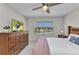 Spacious bedroom with a large window and lake view at 25100 Sandhill Blvd # R104, Punta Gorda, FL 33983
