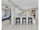 Bright kitchen with breakfast bar and view to bedroom at 25100 Sandhill Blvd # R104, Punta Gorda, FL 33983
