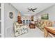 Spacious living area with a glimpse into the bright, updated kitchen at 25100 Sandhill Blvd # R104, Punta Gorda, FL 33983