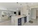 Kitchen island with a granite countertop and stainless steel appliances at 3 Bermuda Cir # 49, Englewood, FL 34223