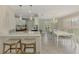 Kitchen with a breakfast bar and adjacent formal dining area at 3 Bermuda Cir # 49, Englewood, FL 34223