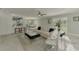 Bright living room features neutral furniture and an open concept layout at 3 Bermuda Cir # 49, Englewood, FL 34223