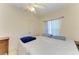 Comfortable bedroom with neutral walls and a window with a view at 315 Southland Rd, Venice, FL 34293