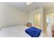Bedroom featuring a neutral color palette, a window, and en-suite bathroom at 315 Southland Rd, Venice, FL 34293
