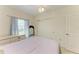 Bedroom featuring a bed, dresser, closet and ceiling fan at 315 Southland Rd, Venice, FL 34293