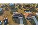 Aerial view of a single-Gathering home featuring a private backyard swimming pool at 3265 Sunrise Trl, Port Charlotte, FL 33952