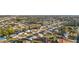 An aerial view showing the neighborhood with canals and varied home styles at 3265 Sunrise Trl, Port Charlotte, FL 33952