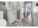 Charming bathroom with patterned tile floor and modern white vanity at 3265 Sunrise Trl, Port Charlotte, FL 33952