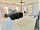 The primary bedroom features an ensuite bath and natural light at 3265 Sunrise Trl, Port Charlotte, FL 33952
