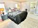 The primary bedroom features an ensuite bath and natural light at 3265 Sunrise Trl, Port Charlotte, FL 33952