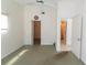 Spacious bedroom featuring a ceiling fan, closets, and an adjacent bathroom at 3300 Loveland Blvd # 2103, Punta Gorda, FL 33980