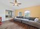 Comfortable living room with hardwood floors and a large sectional sofa at 4461 Baroda Ave, North Port, FL 34287