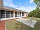 Enclosed screened porch leading to a patio for relaxing outdoor living at 4461 Baroda Ave, North Port, FL 34287