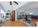 Inviting dining area with an elegant table set and open view to the well-lit living room at 5020 Brittany S Dr # 324, St Petersburg, FL 33715