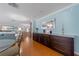 Large living room and dining room featuring long countertop storage with a view at 5020 Brittany S Dr # 324, St Petersburg, FL 33715