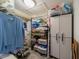 Practical storage closet to maximize organization with wire racks, white cabinets, and ample space for storage solutions at 5020 Brittany S Dr # 324, St Petersburg, FL 33715