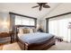 Luxurious bedroom with vaulted ceiling, plush bed, and large windows providing ample natural light at 5239 Siesta Cove Dr, Sarasota, FL 34242
