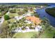 Elegant estate featuring a spacious layout, grand driveway, and serene waterfront setting at 7440 Riverside Dr, Punta Gorda, FL 33982