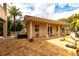 A covered patio off of the backyard with views of the yard at 7440 Riverside Dr, Punta Gorda, FL 33982